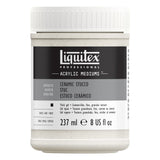 A white plastic jar of Liquitex Professional Acrylic Mediums in Ceramic Stucco, featuring a black and gray label with white text.