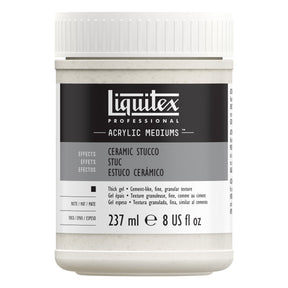 A white plastic jar of Liquitex Professional Acrylic Mediums in Ceramic Stucco, featuring a black and gray label with white text.