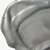Close-up of Liquitex Silver Metallic Medium swatch on a white background